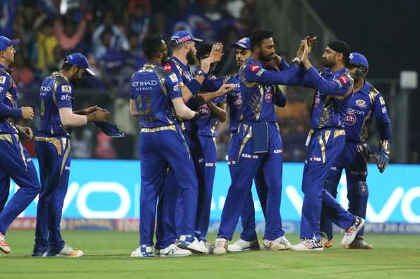 Krunal Pandya celebrates with teammates after his breakthroughs