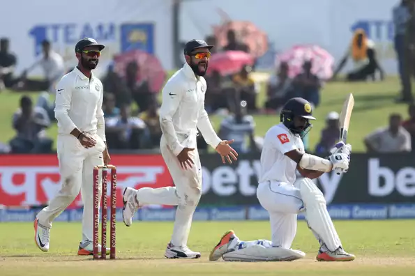 India cruised to victory after dislodging a century stand between Dickwella and Karunaratne.