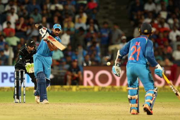 Half centuries from Dhawan and Karthik helped India ease to a win.