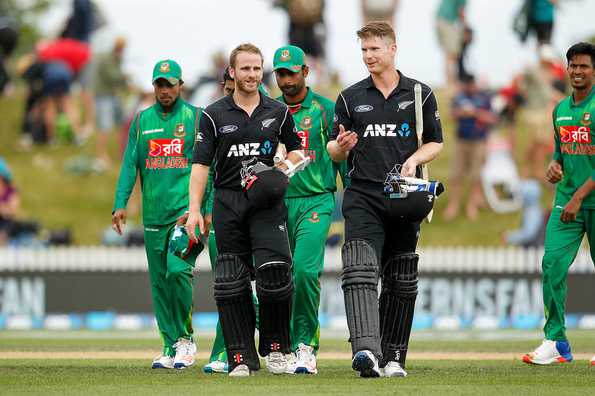 Kane Williamson and James Neesham walk off the field after a satisfying series win against Bangladesh.