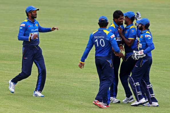 Nuwan Pradeep defended nine runs in the final over to give Sri Lanka a nervy one-run win and a place in the final.