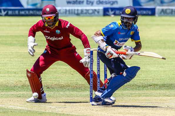 Niroshan Dickwell scored 94 and added 107 with Kusal Mendis.