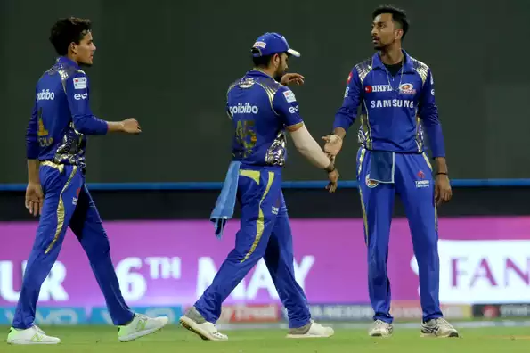 Mumbai Indians won their seventh successive game against KKR to keep their hopes alive 