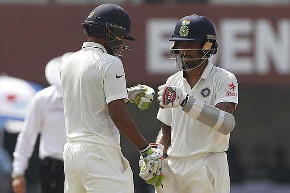 Wriddhiman Saha (right) averages 63.40 in Tests this year