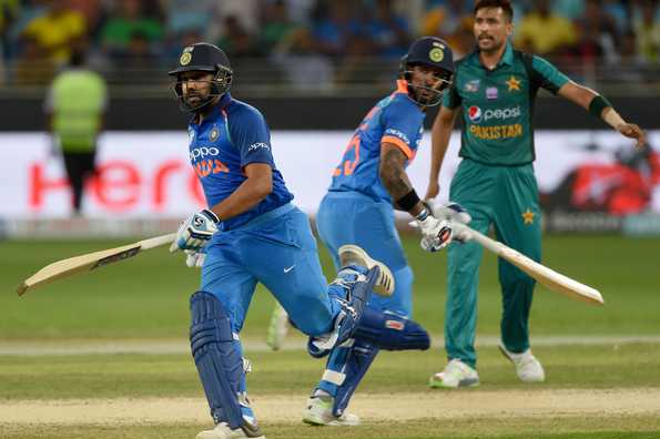 Shikhar Dhawan and Rohit Sharma helped India maul down the target of 238 with 10.3 overs to spare, putting on 210.