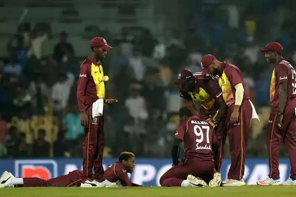 A distraught Windies team after their narrow loss in the final T20I.