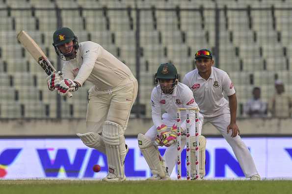 Brendan Taylor has batted steadily but Zimbabwe face a stiff challenge to save Test. 