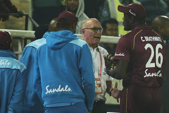 Carlos Brathwaite in conversation with match refree Jeff Crowe