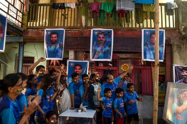 Posters, jerseys and friends: that's quite a set-up to watch a World Cup match!