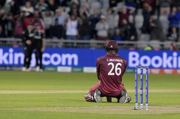 With 5 to win, Carlos Brathwaite went for another six but failed to clear Trent Boult at the fence