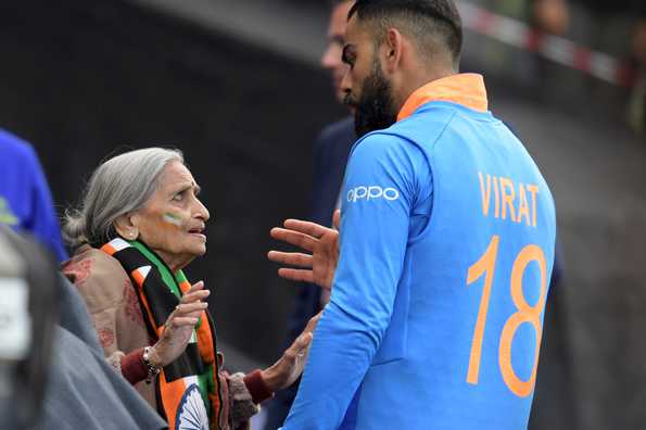 Virat Kohli with Charulatha Patel - an enthusiastic 87-year-young fan of the Indian cricket team