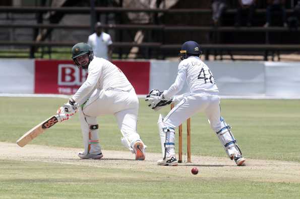 Taylor anchored Zimbabwe's innings with a fine fifty 