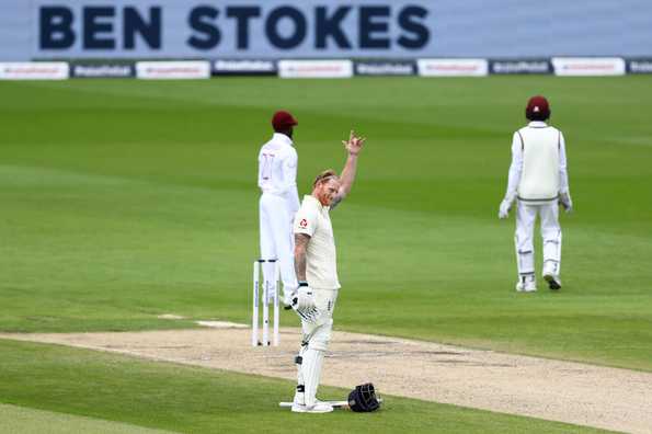 Ben Stokes celebrating a century with a gesture to his father.