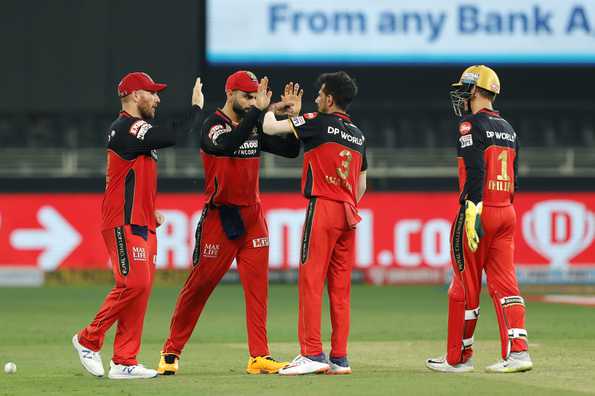 The legspinner picked up 3 for 18 in difficult conditions to help RCB defend 163