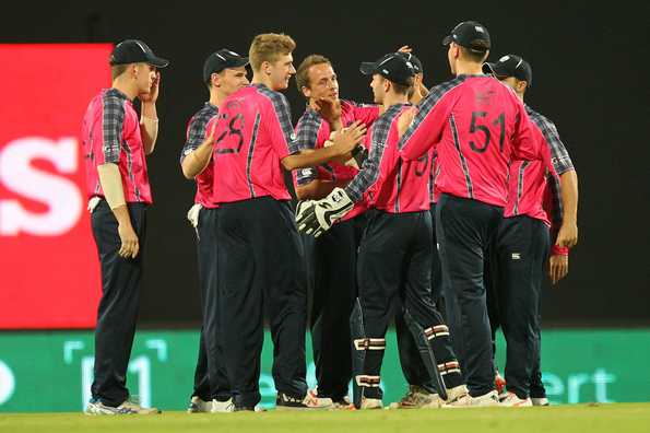 Players celebrating Campbell's wicket.