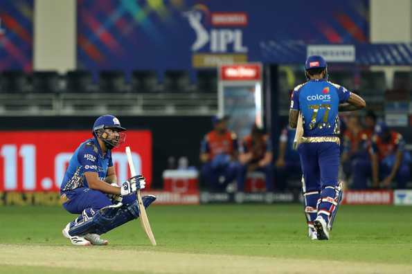 Rohit on his haunches after his misjudgment cost Surya his wicket