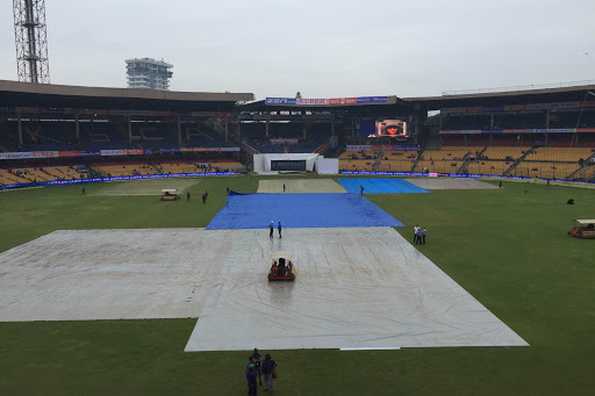 This is latest update from the stadium. Covers are on while there's a slight drizzle.