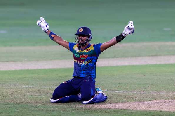 Dasun Shanaka celebrates Sri Lanka's win over India.