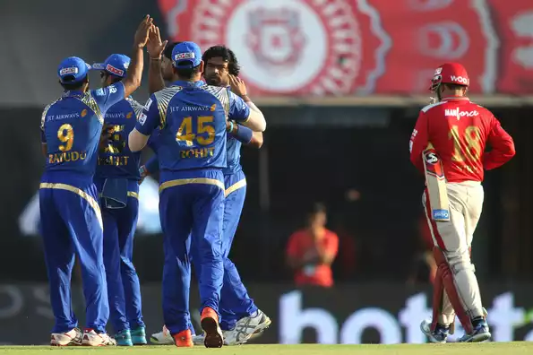 Mumbai Indians stayed alive in IPL 2015 by registering an important 23-run victory over Kings XI Punjab.