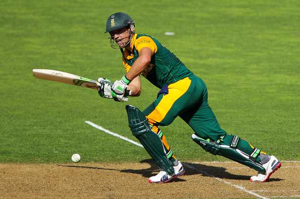 AB de Villiers scored 99 and took two wickets as South Africa thrashed UAE by 146 runs, sealing their place in the quarter-finals.