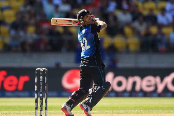 Up and over: Brendon McCullum hits one of his seven sixes during his blitzkrieg 25-ball 77.