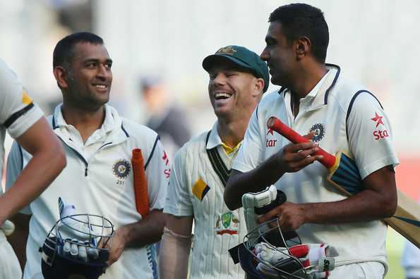 MS Dhoni and R Ashwin share a joke with David Warner after the match ended in a draw.