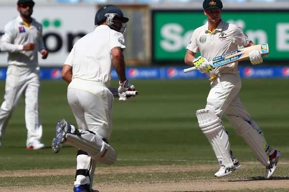 Steve Smith and Mitchell Johnson put on a defiant stand before the former departed on 55.