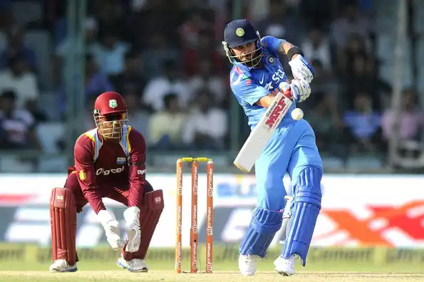 Virat Kohli reacted to his demotion with a measured half-century.