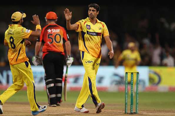 Ashish Nehra celebrates the wicket of Craig Simmons.