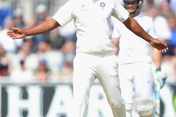 Pankaj Singh heaves a sigh of relief after finally bagging a Test wicket