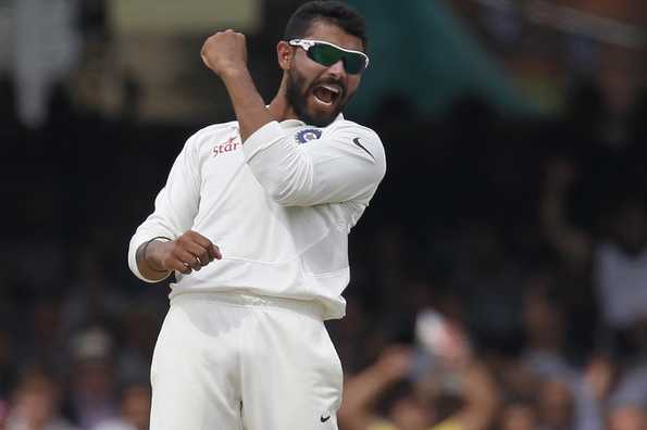 Ravindra Jadeja celebrates after dismissing Sam Robson.