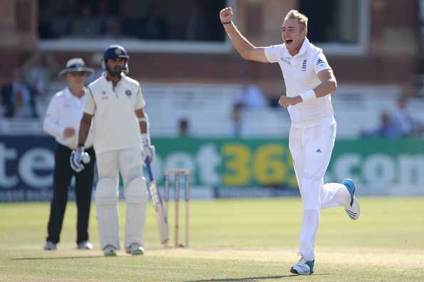 Stuart Broad celebrates dismissing Ajinkya Rahane.