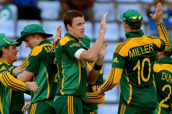 Morne Morkel celebrates with teammates after dismissing Kumar Sangakkara.