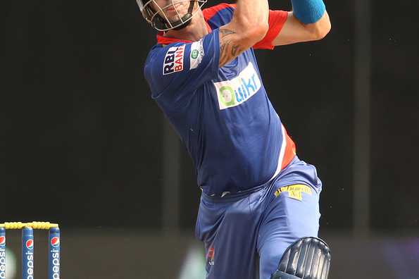 Kevin Pietersen captain of the Delhi Daredevils hits over the top for a six.