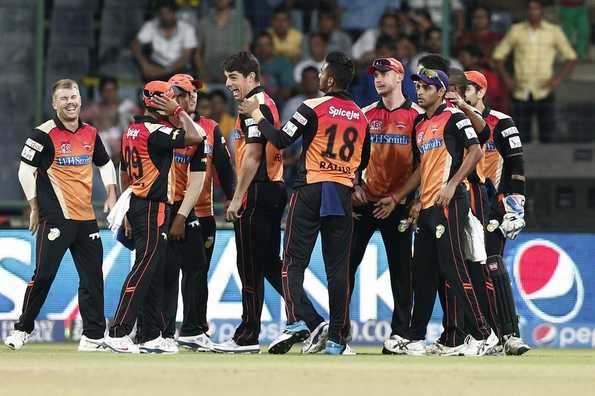 David Warner, Dale Steyn and Moises Henriques of the Sunrisers Hyderabad celebrates the wicket of Dinesh Karthik.