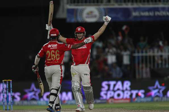 David Miller of the Kings XI Punjab and Cheteshwar Pujara of the Kings X1 Punjab celebrate the win