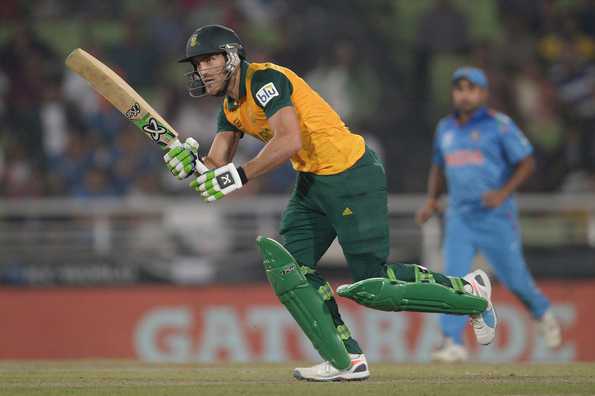 Faf du Plessis plays a shot.