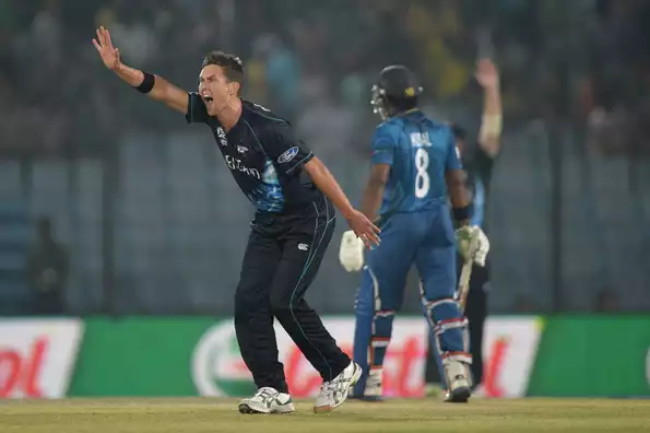 Trent Boult of New Zealand successfully appeals for the wicket of Kusal Perera of Sri Lanka.