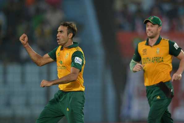 South African bowler Imran Tahir (L) celebrates the wicket of Netherlands batsman Peter Borren during the ICC World Twenty20 tournament cricket match between South Africa and Netherlands at The Zahur Ahmed Chowdhury Stadium in Chittagong on March 27, 2014. 