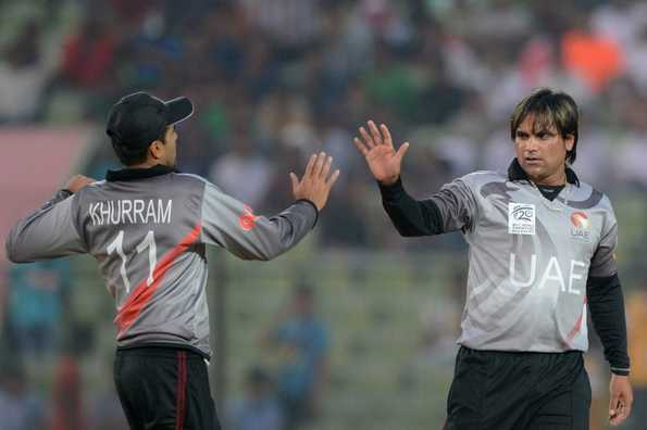 Kamran Shazad celebrates after picking up a wicket.