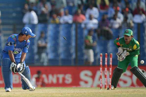 Najibullah Zadran is bowled by Arafat Sunny.