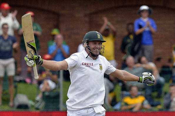 AB de Villiers raises his bat after scoring his 19th Test ton.