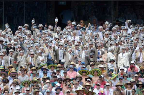 Australian cricket fans dressed as cricket commentator Richie Benaud cheer during day two of the Fifth Ashes Test match between Australia and England at Sydney Cricket Ground on January 4, 2014 in Sydney, Australia. 