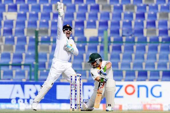 Prasanna Jayawardene celebrates the dismissal of Saeed Ajmal.