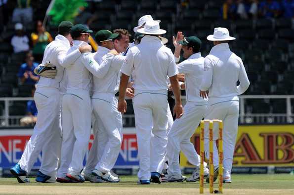 Dale Steyn and teammates celebrate the wicket of Shikhar Dhawan for 13.