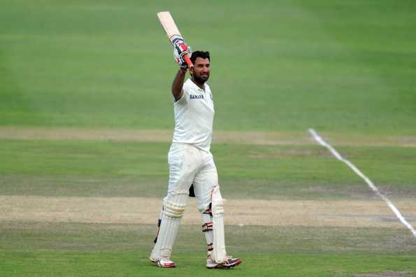 Cheteshwar Pujara celebrates his superb century