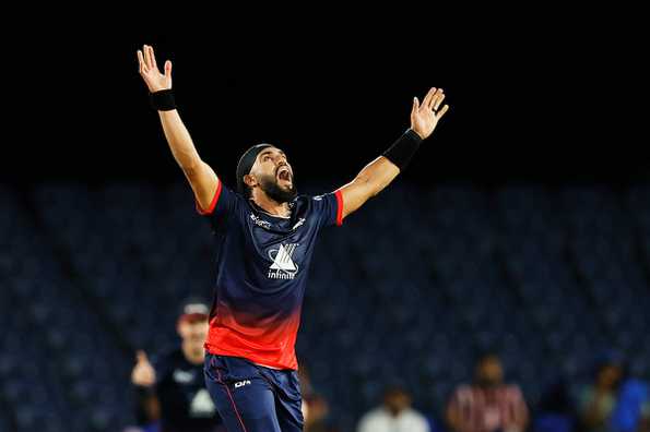 Jasdeep Singh lets out a loud roar after picking up the wicket of Kieron Pollard