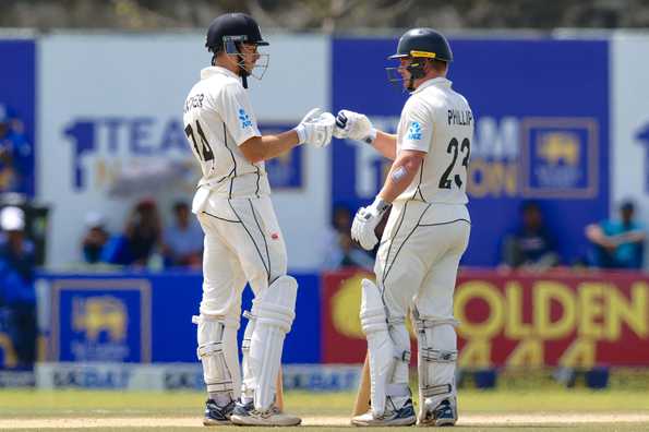 Mitchell Santner and Glenn Phillips led NZ's fight on the fourth morning in Galle