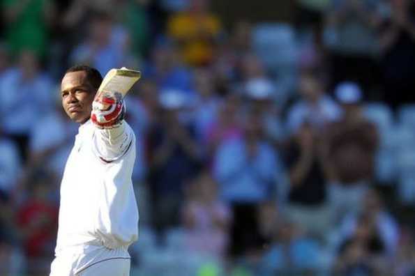 West Indies batsman Marlon Samuels celebrates reaching 100 not out. Samuels's unbeaten hundred and a Test-best score from West Indies captain Darren Sammy rescued the tourists from a dire position on the first day of the second Test against England at Trent Bridge