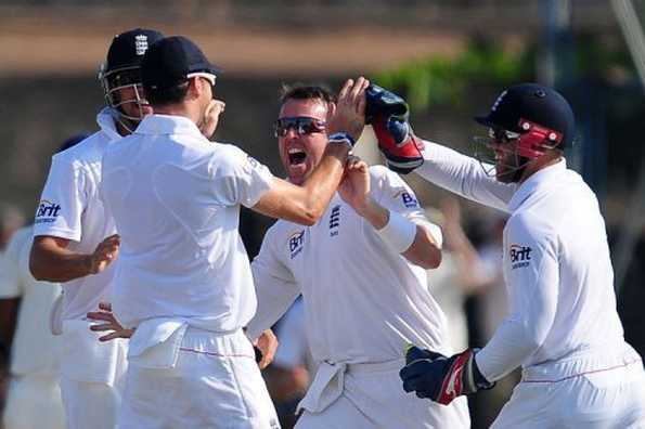 England spinner Graeme Swann (C) celebrates with teammates after dismissing Sri Lanka captain Mahela Jayawardene on the second day of the opening Test in Galle on March 27, 2012. England bounced back after being spun out cheaply by Sri Lanka to leave the first Test evenly poised on Tuesday, the hosts leading the tourists by 209 runs at stumps.